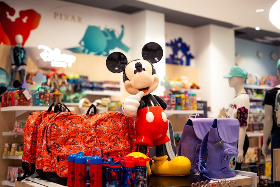 A vibrant retail display featuring Disney-themed merchandise with a prominent Mickey Mouse figure.